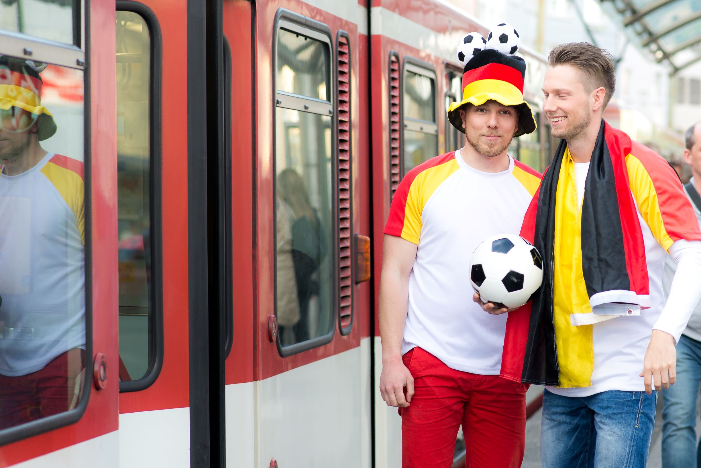 Soccer fans in front of streetcar