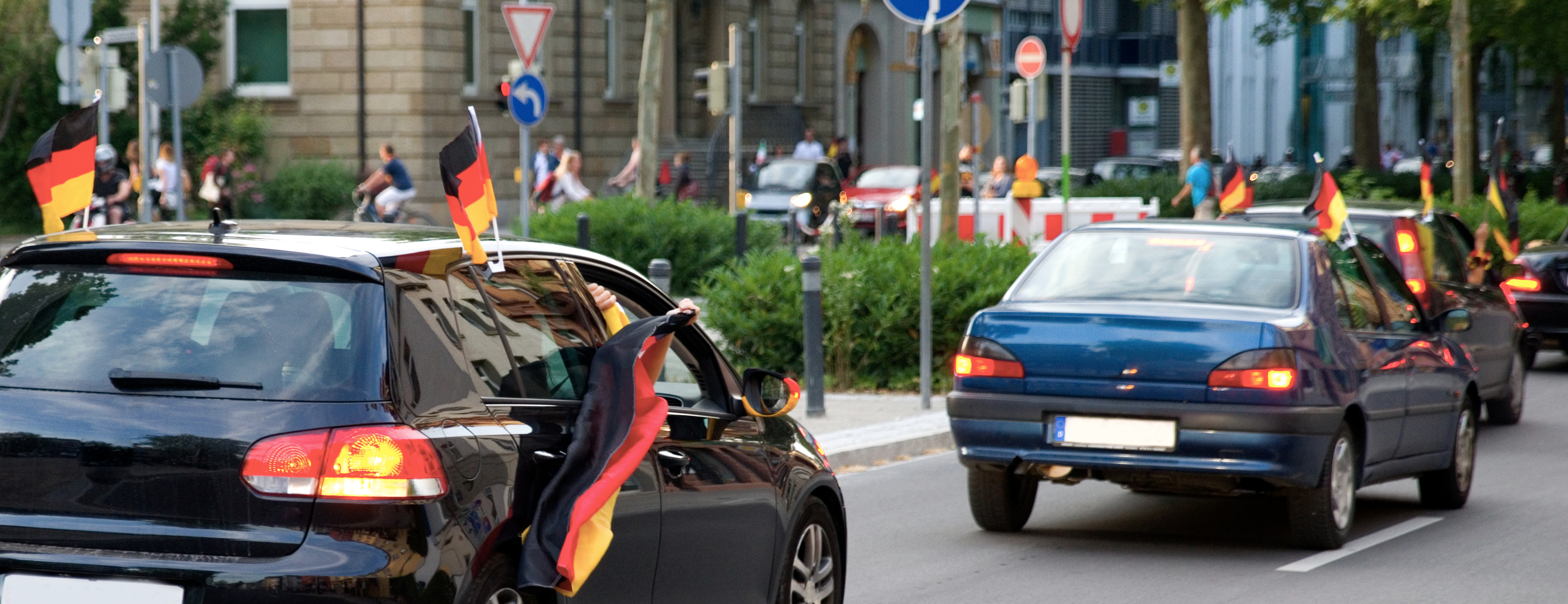 Motorcade with soccer fans